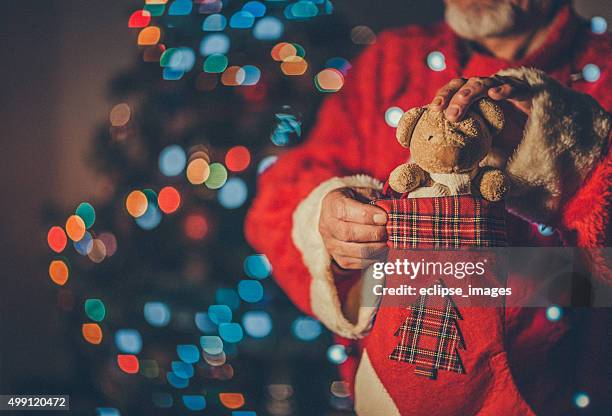 christmas eve - red stockings stock pictures, royalty-free photos & images