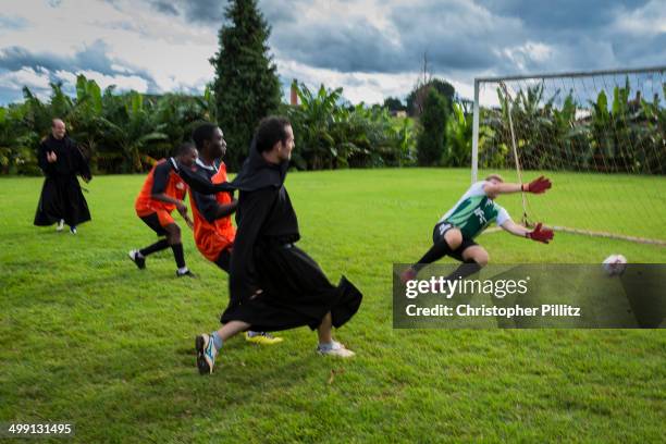 Robbed priests of Santo Tomás de Villanova seminary play a game of football against international student trainees. The seminarian football team have...