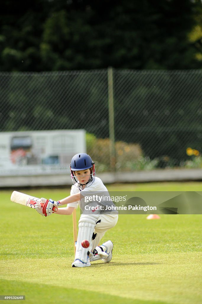 Young Boy Cricket Sweep shot