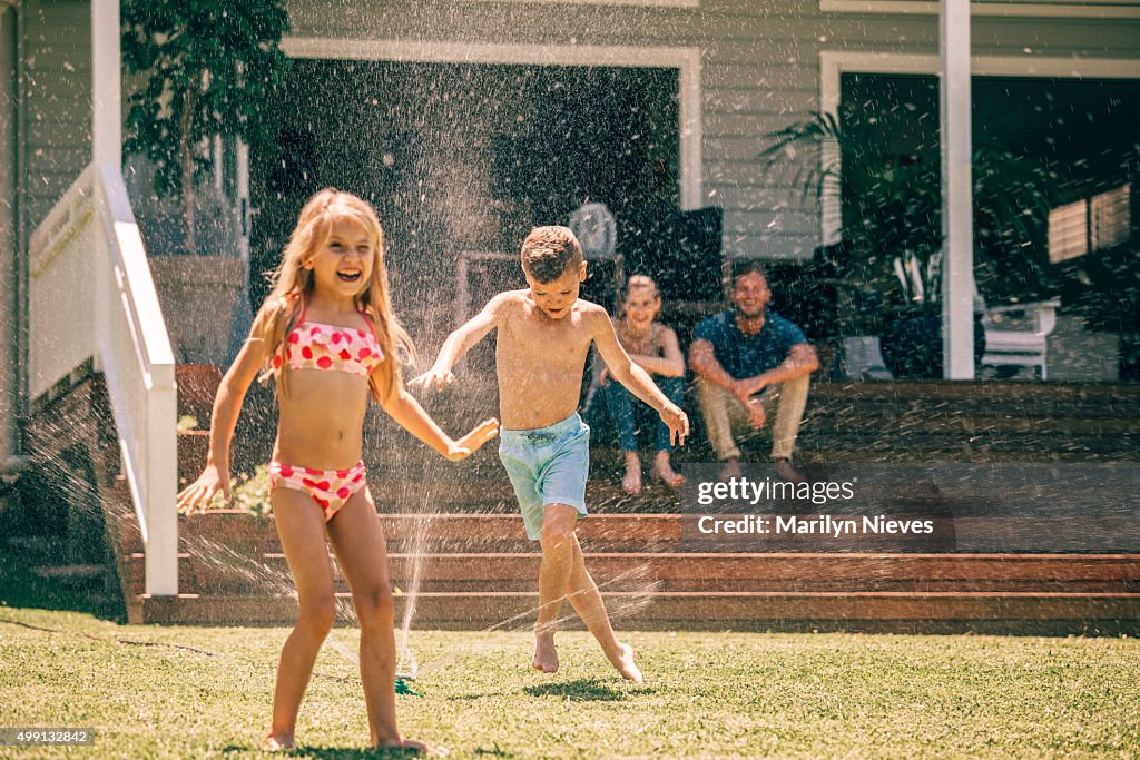 Backyard fun with the sprinklers