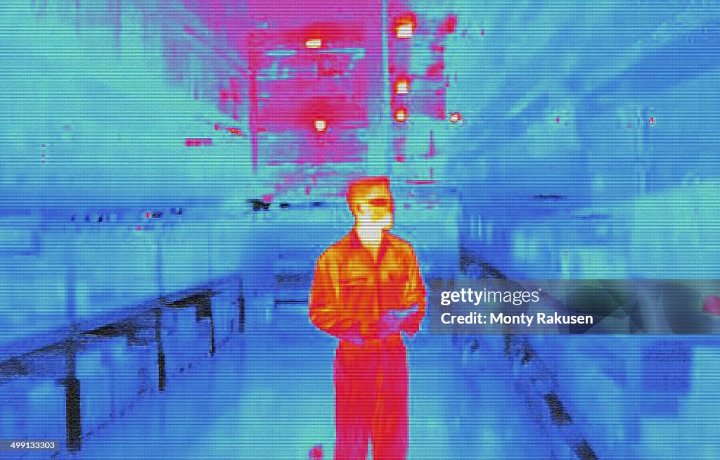 Infra red heat image of warehouse worker in factory