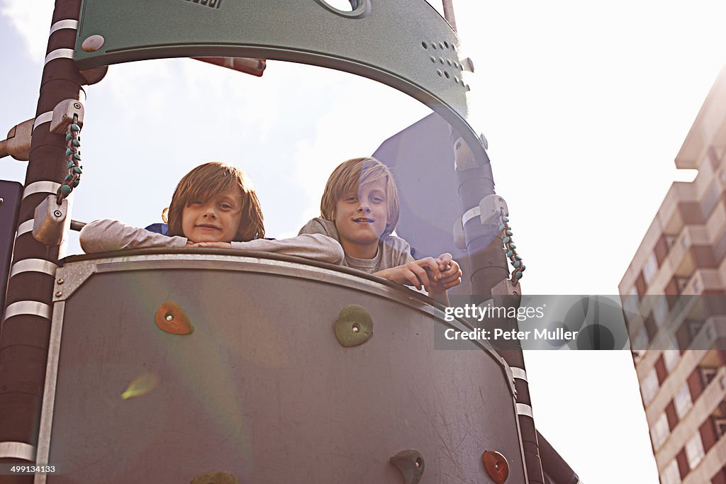 Two boys on climbing frame