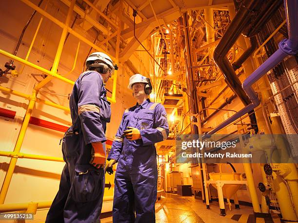 engineers in meeting near reactor hall of nuclear power station - nuclear reactor bildbanksfoton och bilder