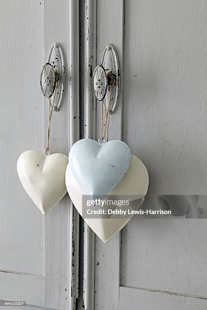 Heart shaped decoration, hanging on handle