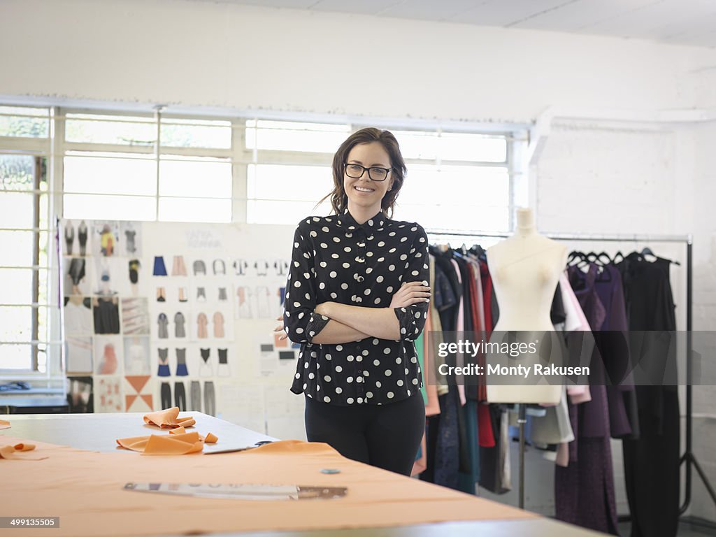 Fashion designer in fashion design studio, portrait