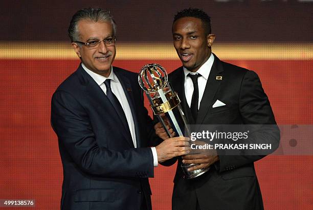 President of the Asian Football Confederation, , Shaikh Salman presents the AFC Player of the Year Award to player Ahmad Khalil of UAE during the...