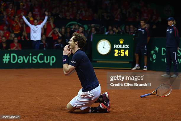 Andy Murray of Great Britain celebrates winning his singles match against David Goffin of Belgium and clinching the Davis Cup on day three of the...