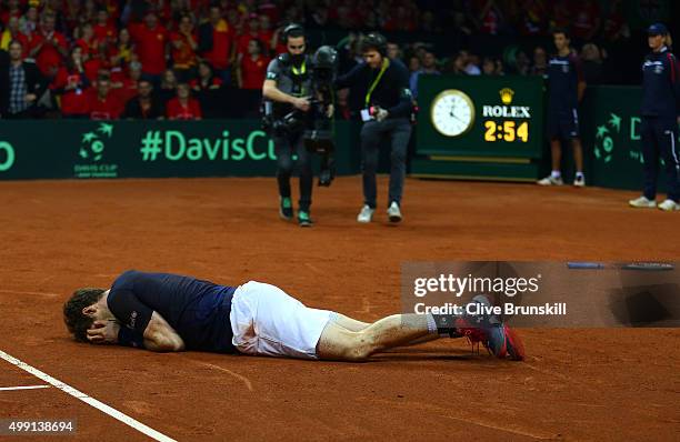 Andy Murray of Great Britain celebrates winning his singles match against David Goffin of Belgium and clinching the Davis Cup on day three of the...