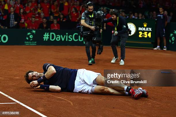 Andy Murray of Great Britain celebrates winning his singles match against David Goffin of Belgium and clinching the Davis Cup on day three of the...