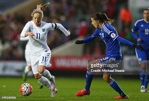 Gemma Davison of England tracked by Milena Nikolic of Bosnia and Herzegovina during the UEFA Women's Euro 2017 Qualifier match between England and...