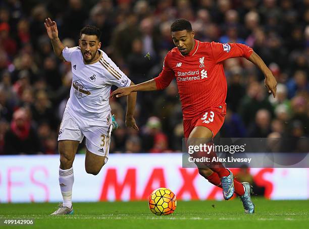 Jordon Ibe of Liverpool takes on Neil Taylor of Swansea City during the Barclays Premier League match between Liverpool and Swansea City at Anfield...