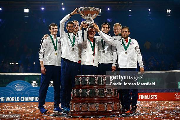 The Great Britain team lift the trophy following their victory during day three of the Davis Cup Final match between Belgium and Great Britain at...