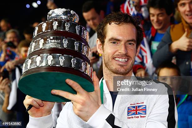 Andy Murray of Great Britain poses with his trophy following victory on day three of the Davis Cup Final 2015 at Flanders Expo on November 29, 2015...