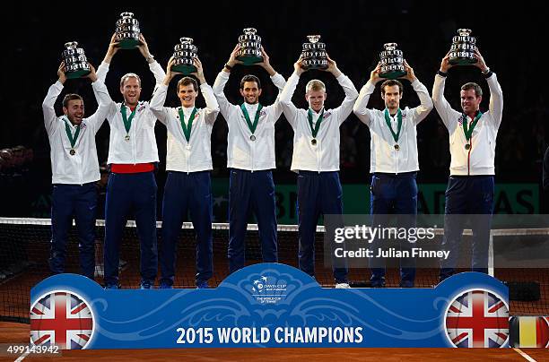 The Great Britain team pose with their trophies following victory on day three of the Davis Cup Final 2015 at Flanders Expo on November 29, 2015 in...