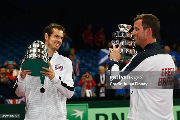 Andy Murray and Leon Smith of the Great Britain team celebrate with their trophies following victory on day three of the Davis Cup Final 2015 at...