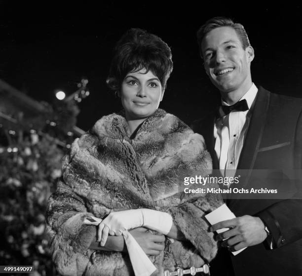Actor Richard Chamberlain with Rossana Schiaffino attends a premier in Los Angeles, California.