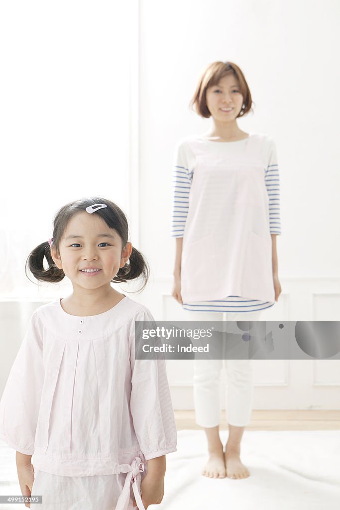 20th generation mother and 5-9 year old daughter who stand
