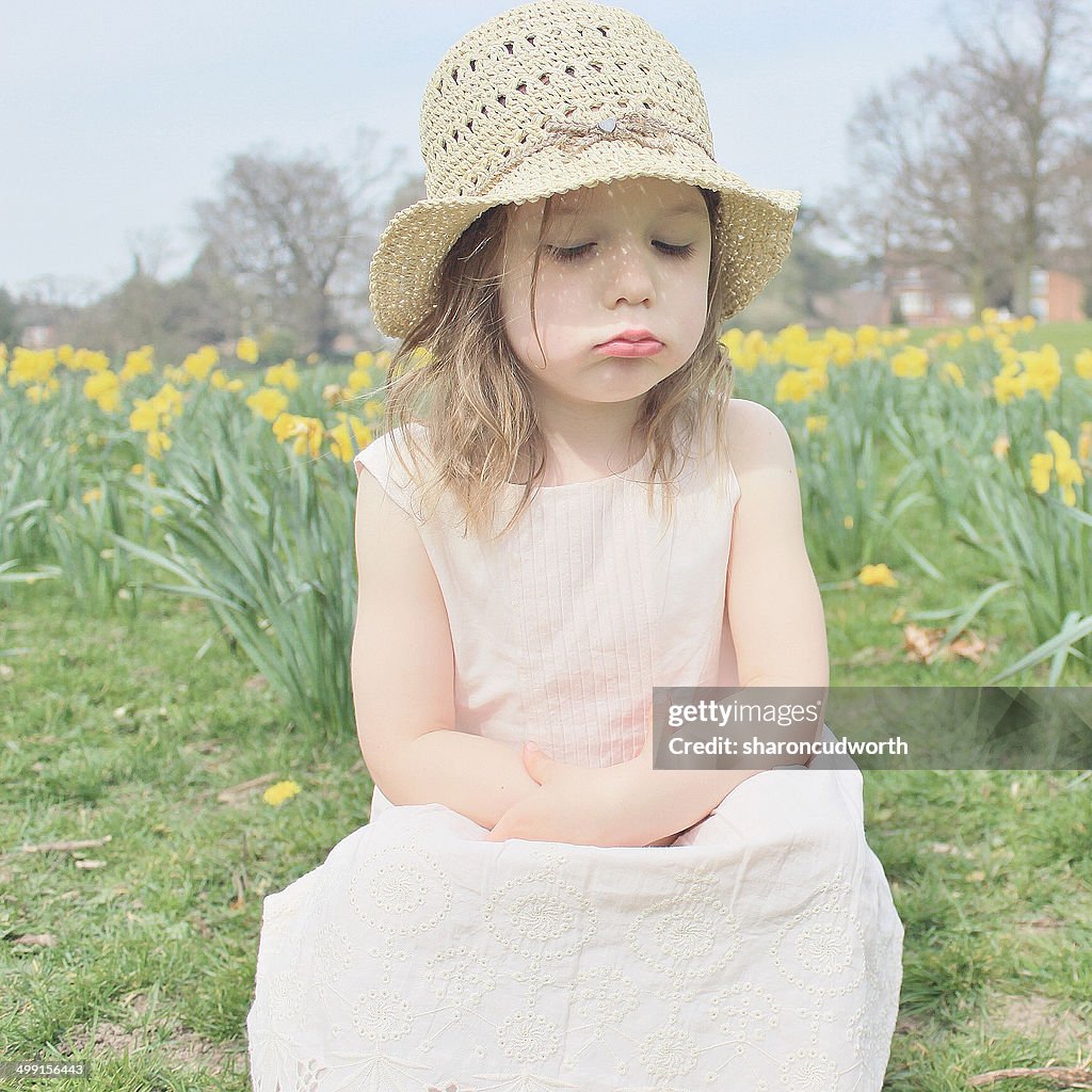 Girl Sitting In A Field Sulking High-Res Stock Photo - Getty Images