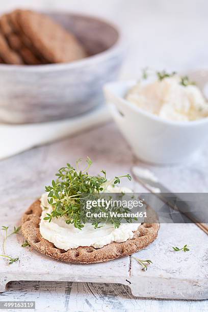 round crispbread, cream cheese and cress - cream cheese stock pictures, royalty-free photos & images