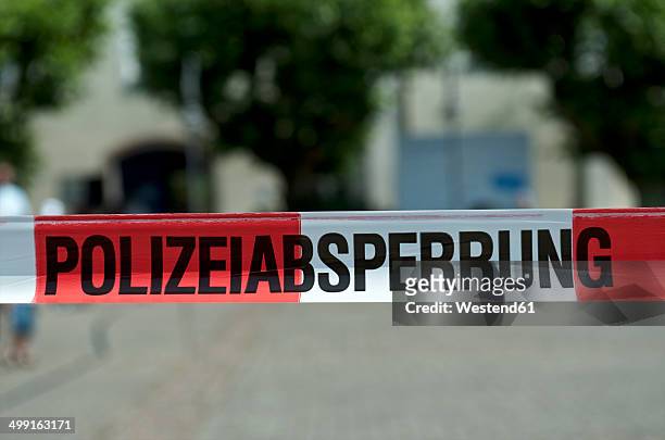 germany, constance, close up of police barrier tape - germany police stock pictures, royalty-free photos & images