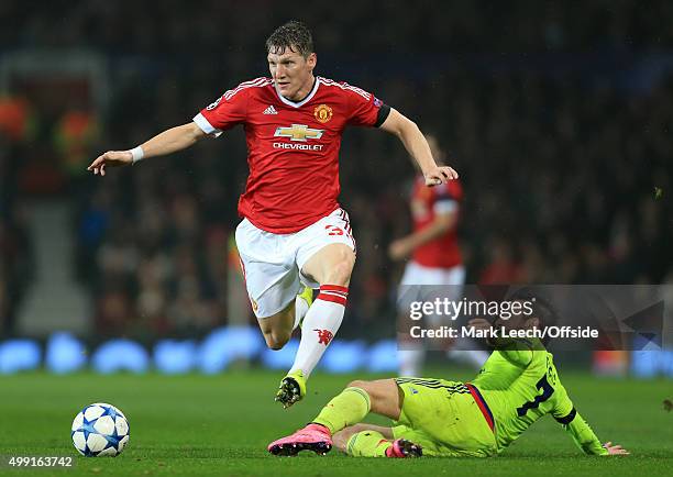 Bastian Schweinsteiger of Man Utd skips over a challenge from Zoran Tosic of CSKA during the UEFA Champions League Group B match between Manchester...