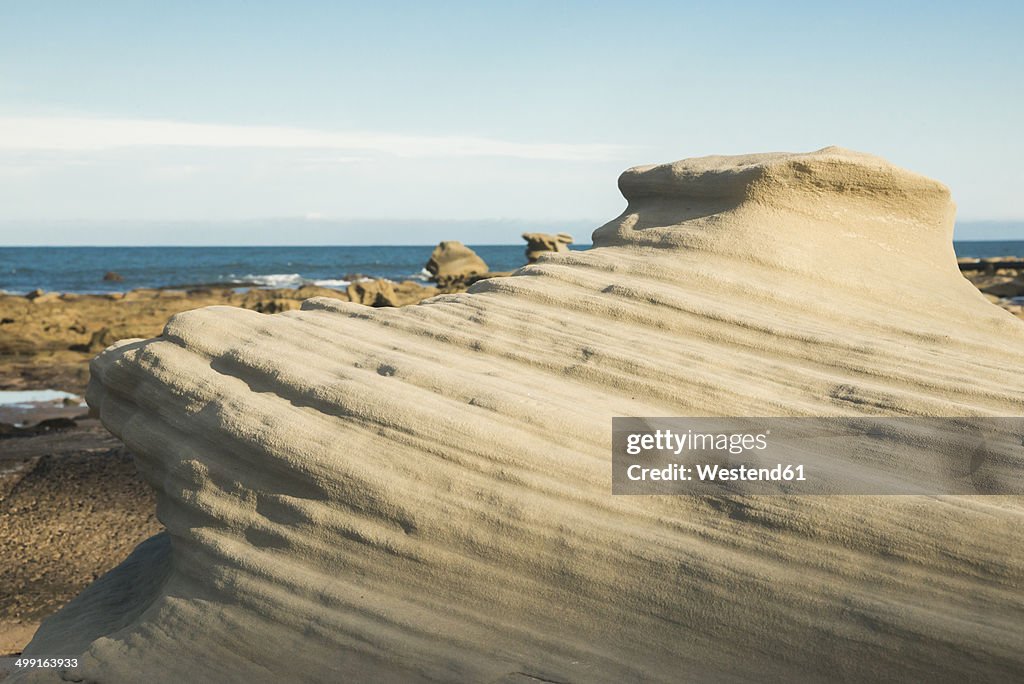 Australia, Seal Rocks, view to outwashed rocks at beach