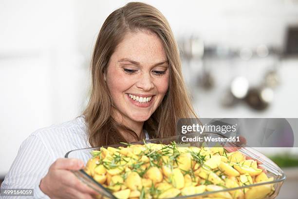 woman preparing potato gratin - prepared potato bildbanksfoton och bilder