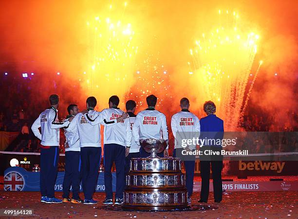 The Great Britain team watch fireworks following their victory on day three of the Davis Cup Final 2015 at Flanders Expo on November 29, 2015 in...