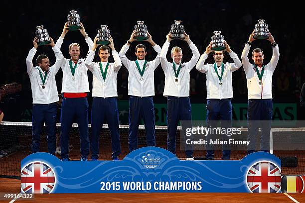 Andy Murray of Great Britain, Jamie Murray, Kyle Edmund, James Ward and Captain Leon Smith of Great Britain celebrate winning the Davis Cup with a...