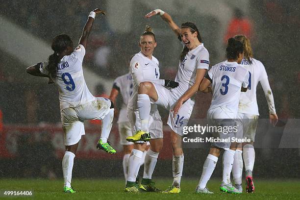 Jill Scott of England celebrates after scoring alongside Eniola Aluko and Laura Bassett during the UEFA Women's Euro 2017 Qualifier match between...