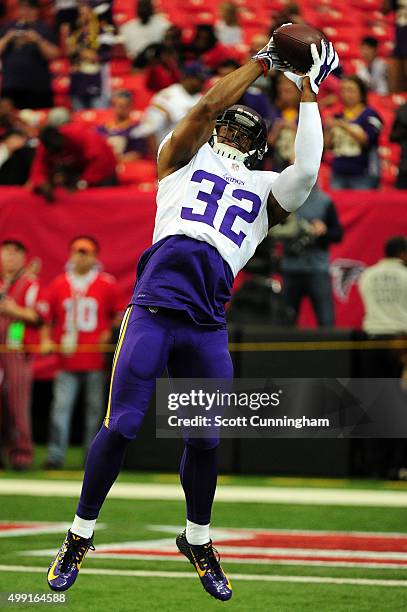Antone Exum Jr. #32 of the Minnesota Vikings warms up prior to the game against the Atlanta Falcons at the Georgia Dome on November 29, 2015 in...