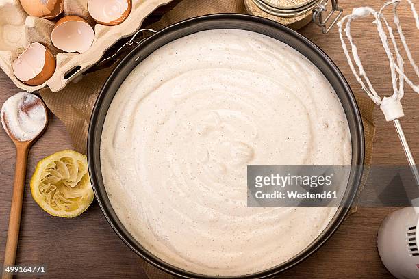 dough of cheese cake in cake pan, elevated view - forma de bolo imagens e fotografias de stock