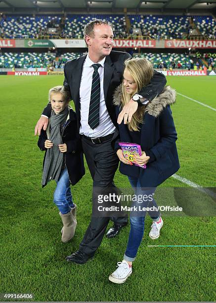 Northern Ireland manager Michael O'Neill celebrates with his daughters after the UEFA EURO 2016 Qualifying Group F match between Northern Ireland and...