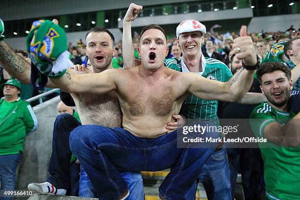 Northern Ireland fans celebrate during the UEFA EURO 2016 Qualifying Group F match between Northern Ireland and Greece at Windsor Park on October 8,...