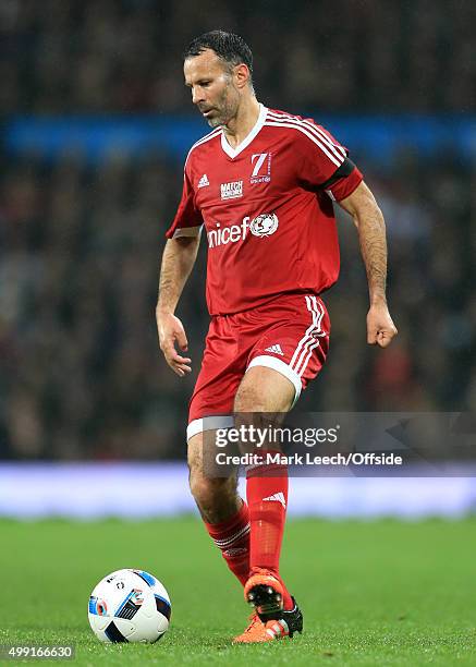 Ryan Giggs of GB in action during David Beckham's Match For Children, in aid of UNICEF, between a Great Britain XI and a Rest of the World XI at Old...