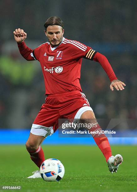 David Beckham of GB in action during David Beckham's Match For Children, in aid of UNICEF, between a Great Britain XI and a Rest of the World XI at...