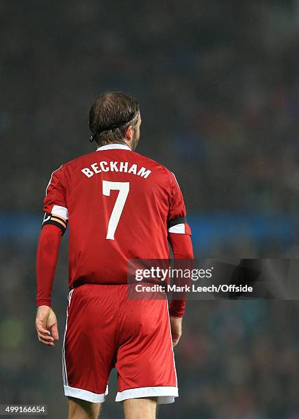 David Beckham of GB wears the famous number 7 shirt during his Match For Children, in aid of UNICEF, between a Great Britain XI and a Rest of the...