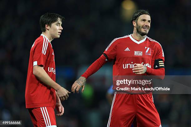 David Beckham of GB and his son, Brooklyn, together during David Beckham's Match For Children, in aid of UNICEF, between a Great Britain XI and a...