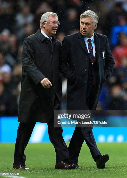 Manager Sir Alex Ferguson and World XI manager Carlo Ancelotti walk together during David Beckham's Match For Children, in aid of UNICEF, between a...