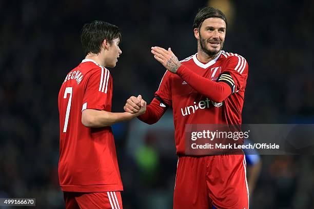 David Beckham of GB and his son, Brooklyn, together during David Beckham's Match For Children, in aid of UNICEF, between a Great Britain XI and a...