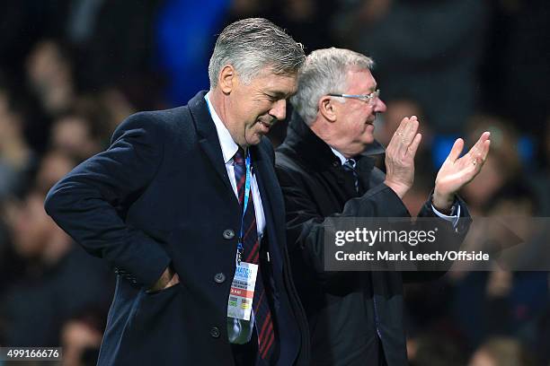 World XI manager Carlo Ancelotti and GB manager Sir Alex Ferguson walk together during David Beckham's Match For Children, in aid of UNICEF, between...