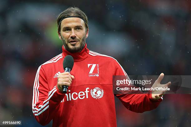 David Beckham speaks to the crowd on a microphone before his Match For Children, in aid of UNICEF, between a Great Britain XI and a Rest of the World...