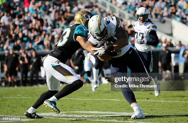 Manti Te'o of the San Diego Chargers scores a touchdown against the defense of Rashad Greene of the Jacksonville Jaguars in the second quarter at...