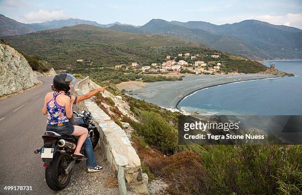 traveling the corsican coastline by motorcycle. - cap corse stock-fotos und bilder