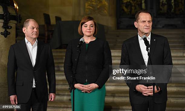 Hamburg's Burgermeister Olaf Scholz, Katharina Fegebank and Alfons Hörmann, DOSB president at the Rathaus as the results of the referendum on...