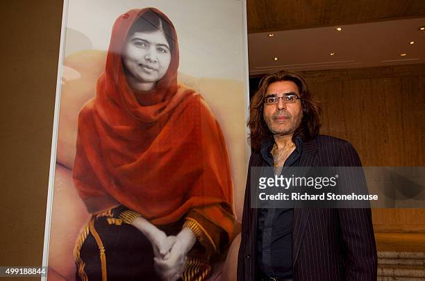Malala Yousafzai's official portrait is unveiled by artist Nasser Azam at Barbar Institute Of Fine Art on November 29, 2015 in Birmingham, England.