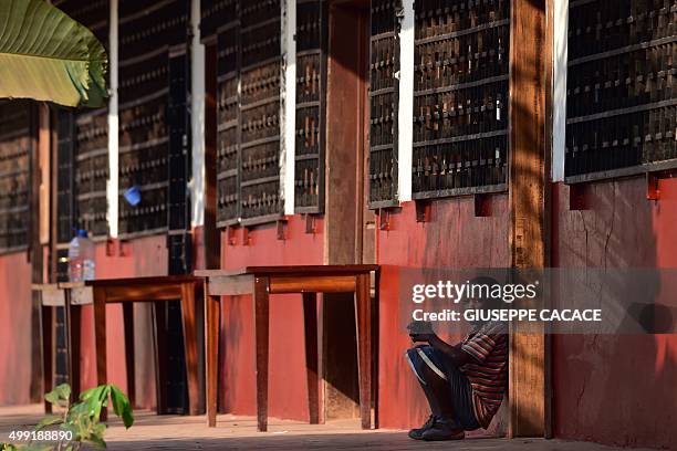 Boy waits the visit of Pope Francis at the Evangelic community in Bangui on November 29, 2015. Pope Francis arrived as "a pilgrim of peace" in...