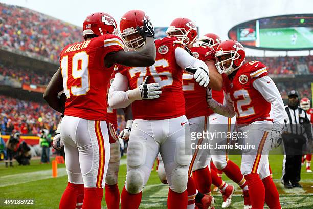 Jeremy Maclin of the Kansas City Chiefs celebrates a touchdown reception with teammate Laurent Duvernay-Tardif at Arrowhead Stadium during the second...
