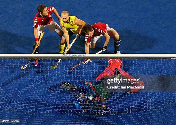 Henry Weir of Great Britain scores during the match between Australia and Great Britain on day three of The Hero Hockey League World Final at the...