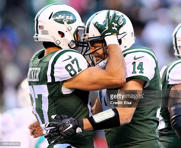 Eric Decker of the New York Jets celebrates his touchdown with Ryan Fitzpatrick in the third quarter against the Miami Dolphins on November 29, 2015...
